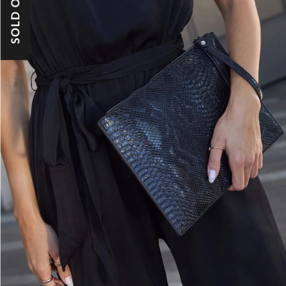 NEW!  In My Skin Textured Zip Clutch